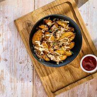 Бяслагтай шарсан төмс Potato wedges with cheese